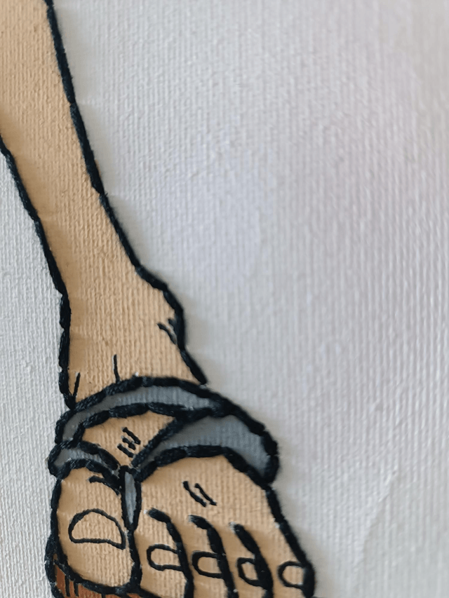 Toile brodée personnage L