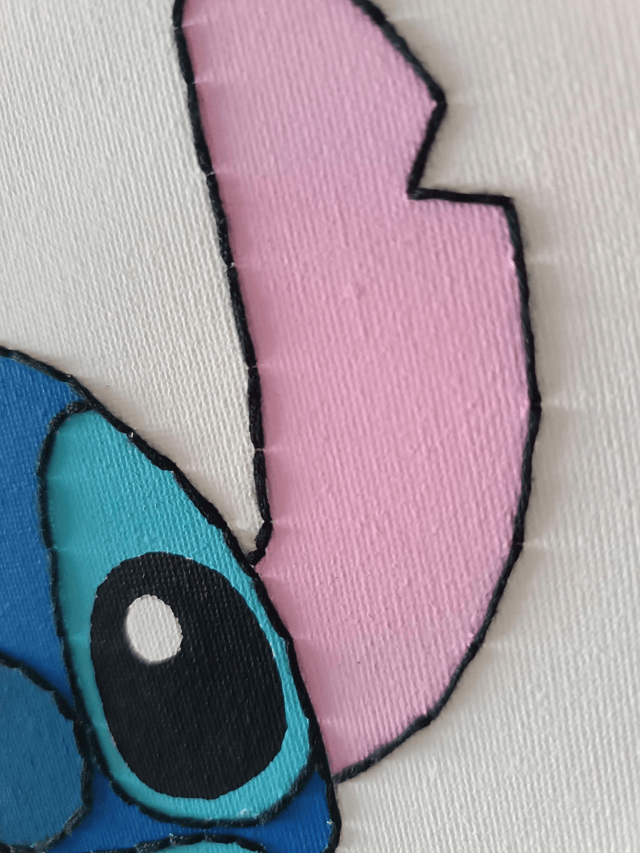 Toile brodée personnalisée STI