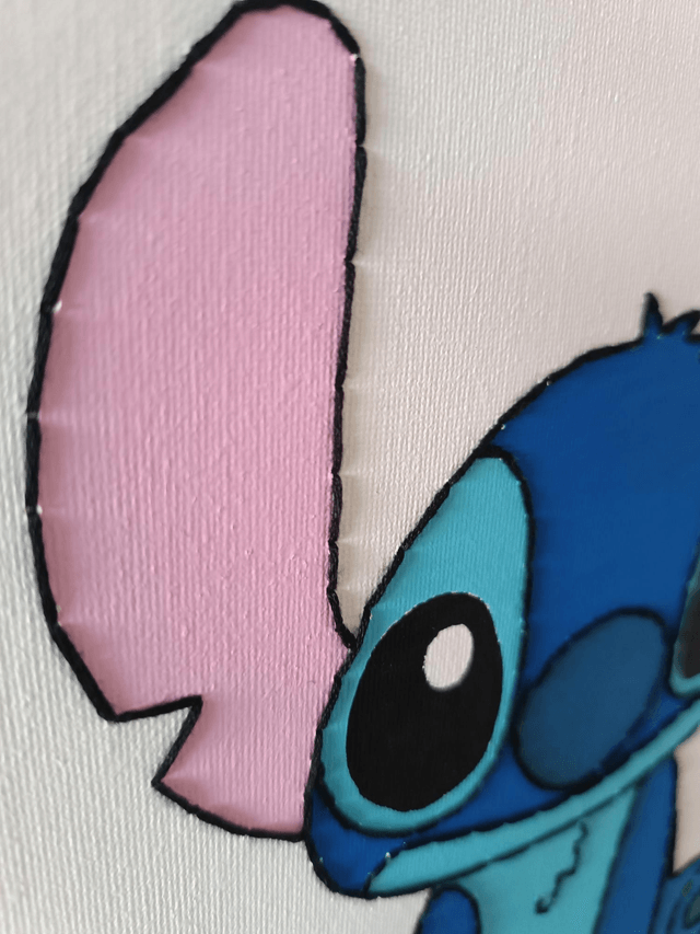 Toile brodée personnalisée STI