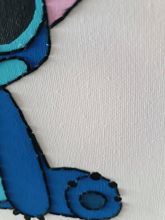 Toile brodée personnalisée STI