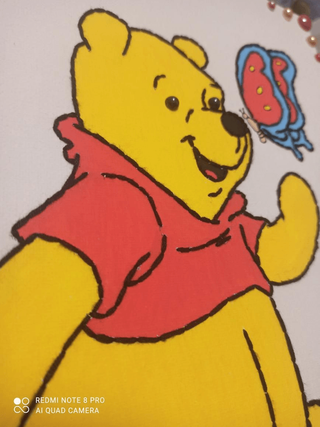 Toile brodée ourson