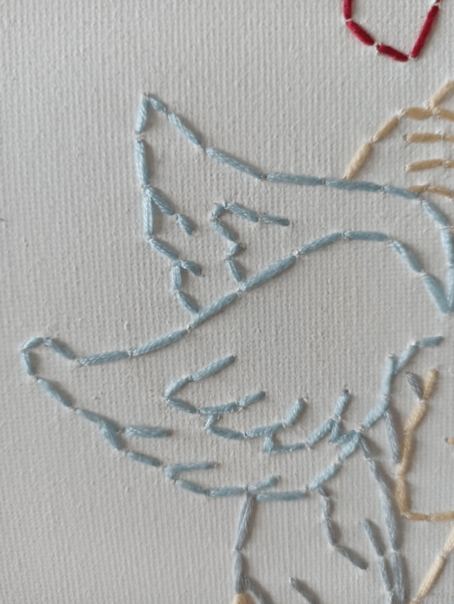 Toile brodée Mamange