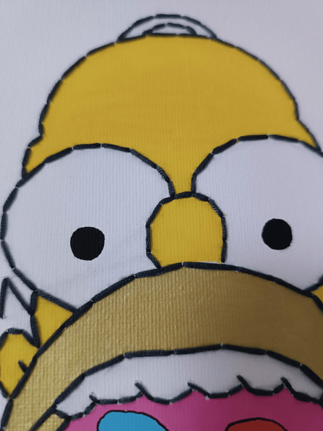 Toile brodée H et son donut