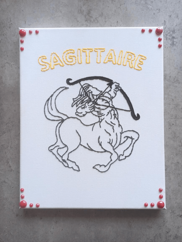 Toile brodée signe astro Sagittaire 