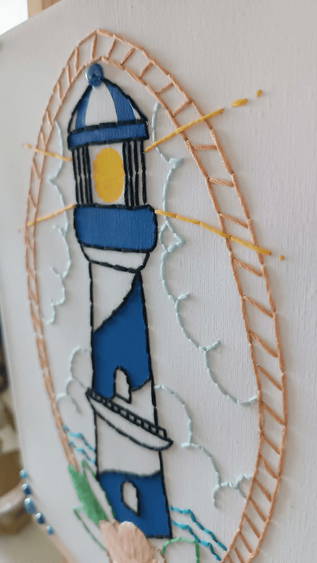 Toile brodée Phare