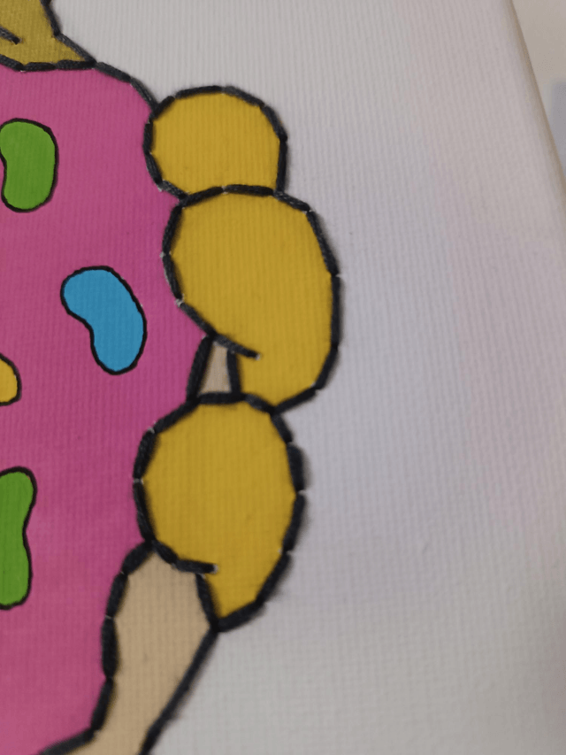 Toile brodée H et son donut