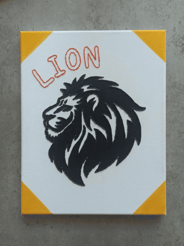 Toile brodée signe astro Lion