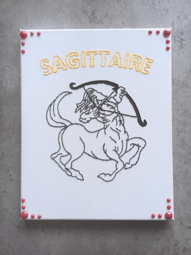 Toile brodée signe astro Sagittaire 